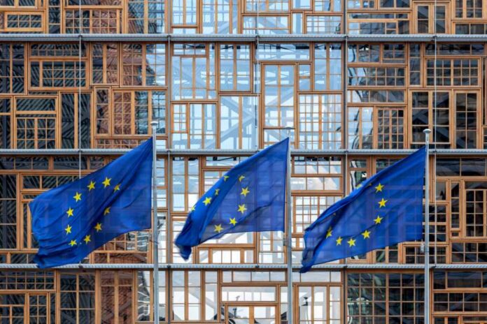 Set,Of,Three,Flags,Of,The,European,Union,Waving,In
