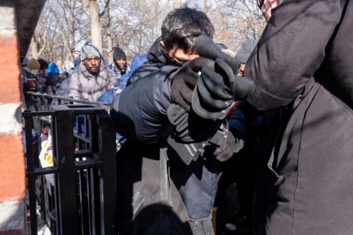 New,York,,Ny,,Usa,January,20,,2024:,Migrant,Holds,A