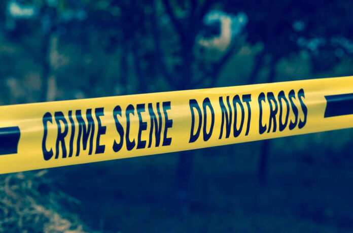 Crime,Scene,Tape,Closeup,,Police,Tape,Do,Not,Cross,Outdoors