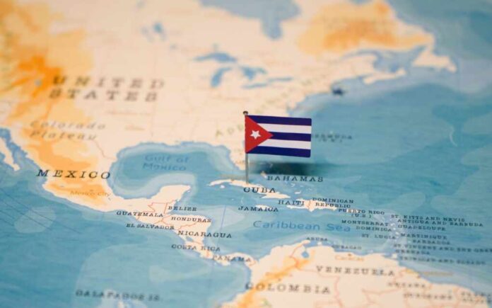 The,Flag,Of,Cuba,On,The,World,Map.