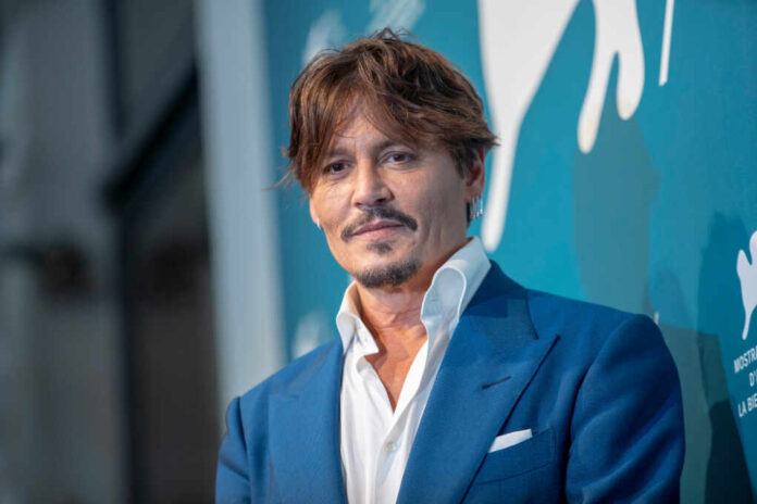 Johnny,Depp,Attends,A,Photocall,For,The,Film,''waiting,For