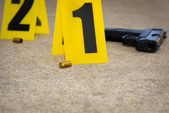 Gun,Shell,Casing,At,Crime,Scene.,Gun,Violence,,Mass,Shooting