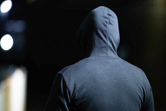 The,Back,View,Of,A,Suspicious,Man,Wearing,A,Hood.