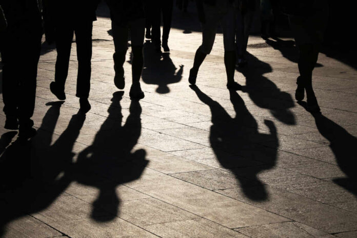 Black,Silhouettes,And,Shadows,Of,People,On,The,Street.,Crowd