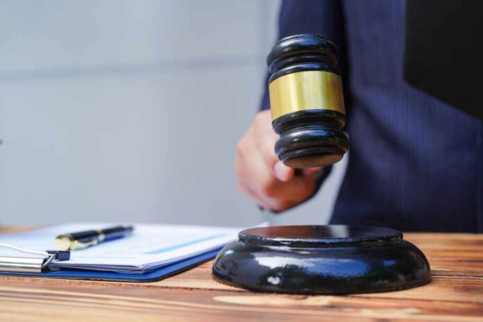 Hands,Of,Asian,And,African,Male,Lawyers,Working,With,Contract