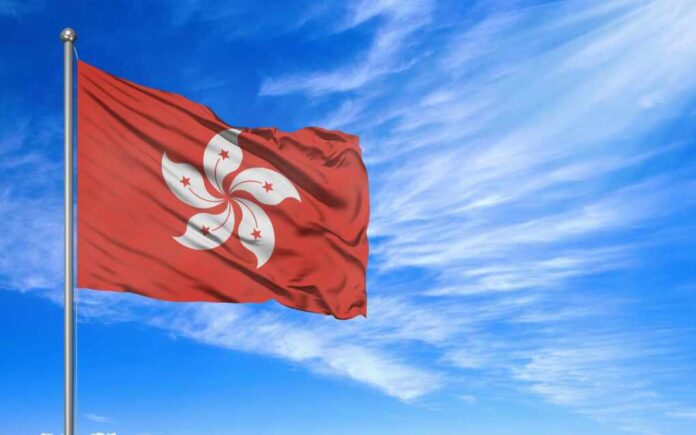 Hong,Kong,Flag,Wave,With,Blue,Sky