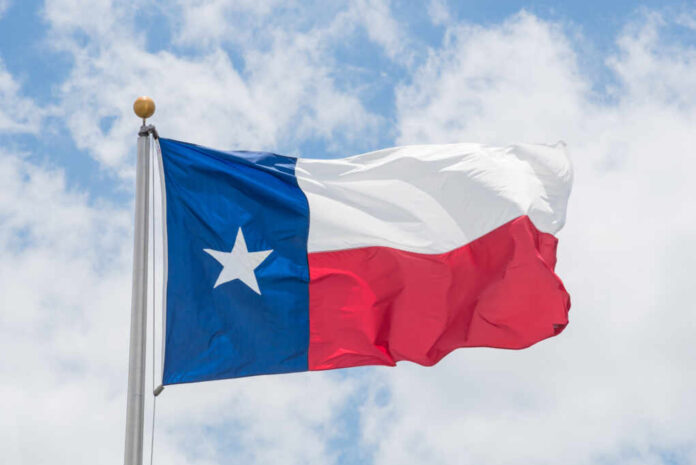 Large,Texas,(the,Lone,Star),Flag,Waving,On,Flag,Pole