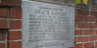 Plaque describing Gracie Mansion, a historical landmark in New York City