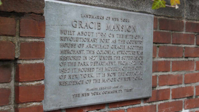 Plaque describing Gracie Mansion, a historical landmark in New York City