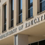 Massive Workforce Cut: Education Department Slashed Exterior view of the U.S. Department of Education building with prominent signage