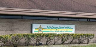 Exterior view of the Polk County Sheriff's Office building with a sign