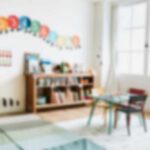 Daycare Director’s $2.75M Theft Shocks Brooklyn A bright and colorful children's room with a bookshelf and a play table