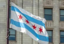 Chicago flag waving in front of a building