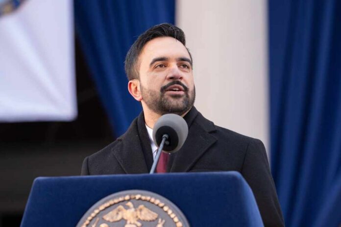 Man speaking at a podium during a formal event