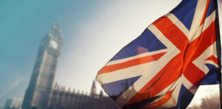 British flag waving in front of Big Ben in London