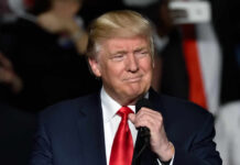 Trump Fundraiser Blitz Stuns House GOP Donald Trump speaking at a rally with a microphone