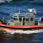U.S. Coast Guard boat navigating through water