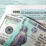 U.S. Individual Income Tax Return form with cash