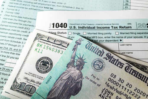 U.S. Individual Income Tax Return form with cash