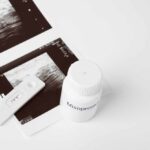 Ultrasound images and a bottle of misoprostol next to a pregnancy test