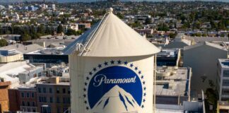 Aerial view of the Paramount water tower with the city in the background