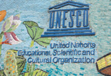UNESCO’s 100% Tsunami Warning – Are We Ready? UNESCO sign on a colorful mosaic wall