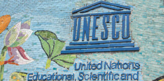 UNESCO’s 100% Tsunami Warning – Are We Ready? UNESCO sign on a colorful mosaic wall