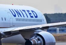Cockpit Chaos Halts United Flight Close-up view of a United Airlines airplane wing and engine