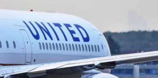 Close-up view of a United Airlines airplane wing and engine