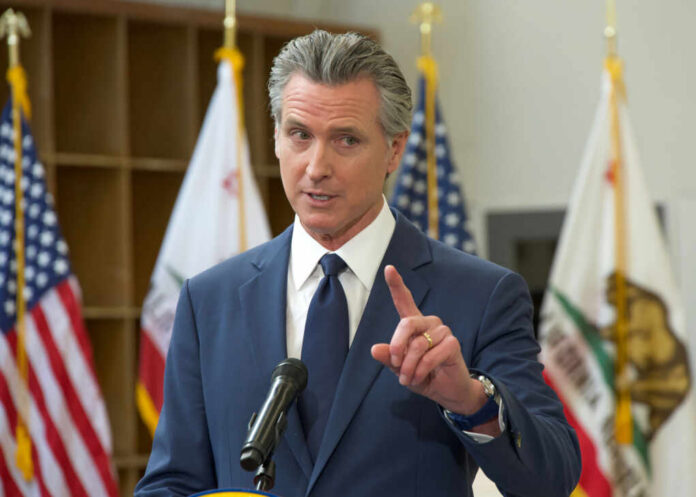 shutterstock_2567671125 A government official speaking at a podium during a press conference