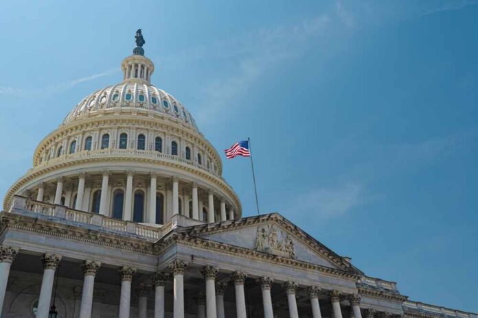 Us,Congress,,Capitol.,Washington,Dc,Skyline,Featuring,The,Capitol.,Senate The U.S. Capitol building with an American flag flying against a blue sky