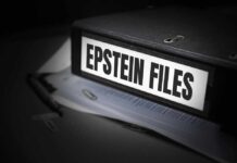 Royal Scandal: Police Uncover Dark Secrets A black binder labeled 'Epstein Files' with papers and a pen beside it