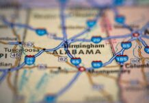 Civil Rights Uproar: Alabama’s Controversial Map Approved Close-up of a road map highlighting Alabama and nearby cities