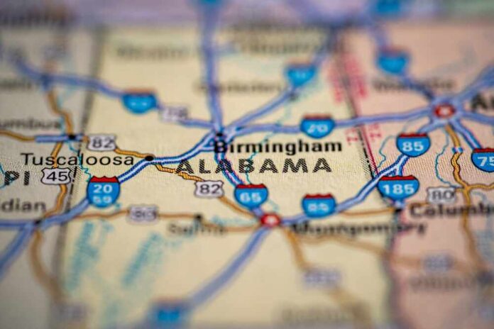 Close-up of a road map highlighting Alabama and nearby cities