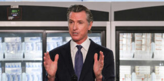 Hypocrisy Alert: Governor Blocks CA, Pushes DC Tax California governor speaking at a press conference about insulin pricing
