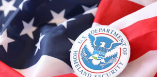 Federal Squeeze Sparks Election War U.S. Department of Homeland Security emblem on an American flag