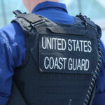 War Powers Gone Wild At Sea Coast Guard officer in uniform with a visible badge