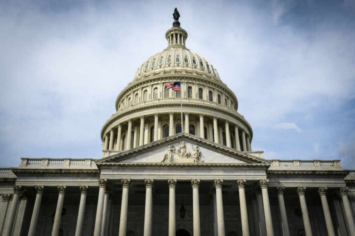 The U.S. Capitol building with an American flag flying in front
