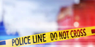 Cops Crushed, Suspect Dead — What Went Wrong? Yellow police tape reading DO NOT CROSS at a crime scene