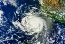 Monster Wave Hammers Hawaii Condos Satellite image of a powerful hurricane over the ocean