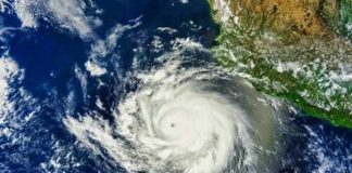 Monster Wave Hammers Hawaii Condos Satellite image of a powerful hurricane over the ocean