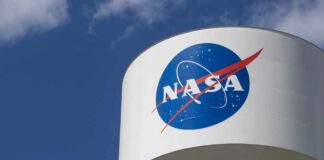 Aging Hardware Rattles Space Station NASA logo on a water tower against a blue sky