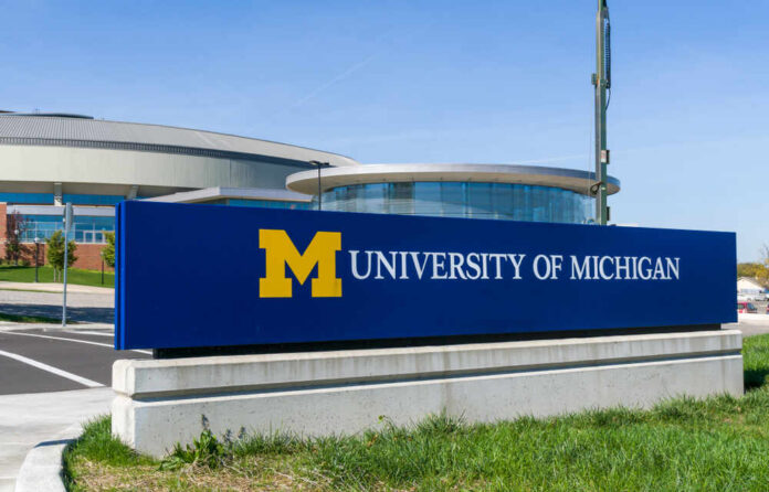 Ann,Arbor,,Mi/usa,-,October,20,,2017:,Entrance,Sign,To University of Michigan campus sign in front of modern buildings