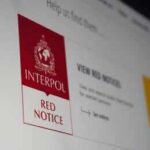 American Heir Faces Spain Extradition Fight Computer screen showing INTERPOL red notice page
