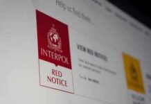American Heir Faces Spain Extradition Fight Computer screen showing INTERPOL red notice page