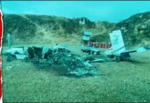 Conflicting Claims After Plane Attack Indonesian Soldiers Recover Body of American Pilot Killed