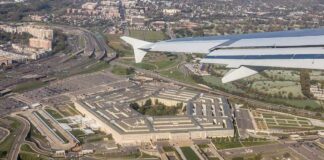 New Military Partnership Plan Questioned Pentagon building viewed from airplane window