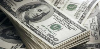 Stack of US 100 dollar bills