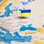 Iran Warns Payback After Caspian Blast Ukraine flag pin on a map of Eastern Europe
