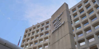 Did Immigration Drive Housing Prices Higher? HUD headquarters concrete tower and curved federal building facade